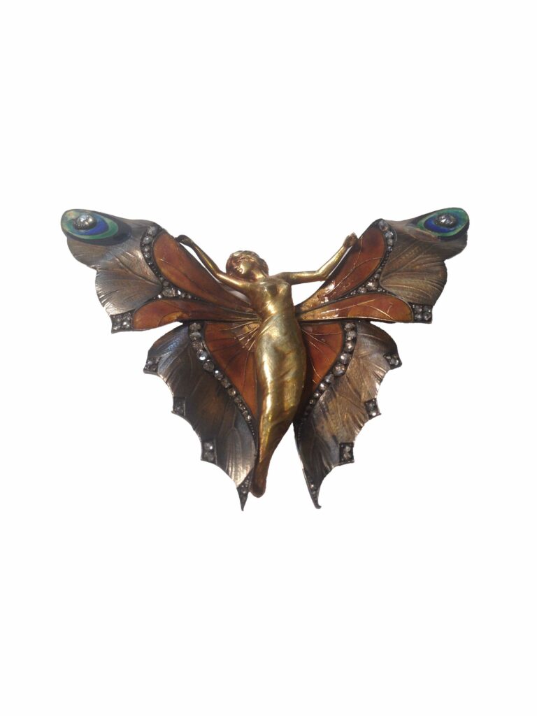 Adjugé 12 000_Belle broche en or jaune 18 k.