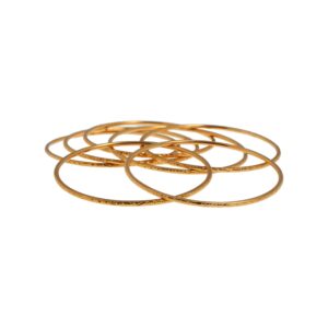 P3404-0001 - Bracelet semainier en or rose 18K (750°/°°) formé de sept jonc à motifs ciselés en frise. Travail marocain. Poids net: 82,3 gr. D: 70 mm - Adjugé 5 750 €