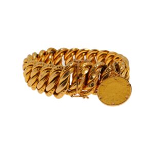 Bracelet en or jaune 18k (750°/°°) à maille gourmette retenant une pièce de 20 Francs 1858 A, Napoléon III tête nue. Poids : 56,6 gr - Adjugé 4 020 €