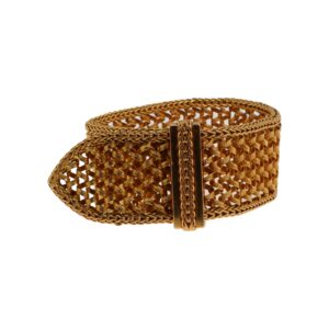 Bracelet ceinture - Bracelet ceinture en or jaune 18K (750°/°°) à maille souple ajourée, fermoir ceinture. Poids brut : 70,5 gr. - Adjugé 4 890 €