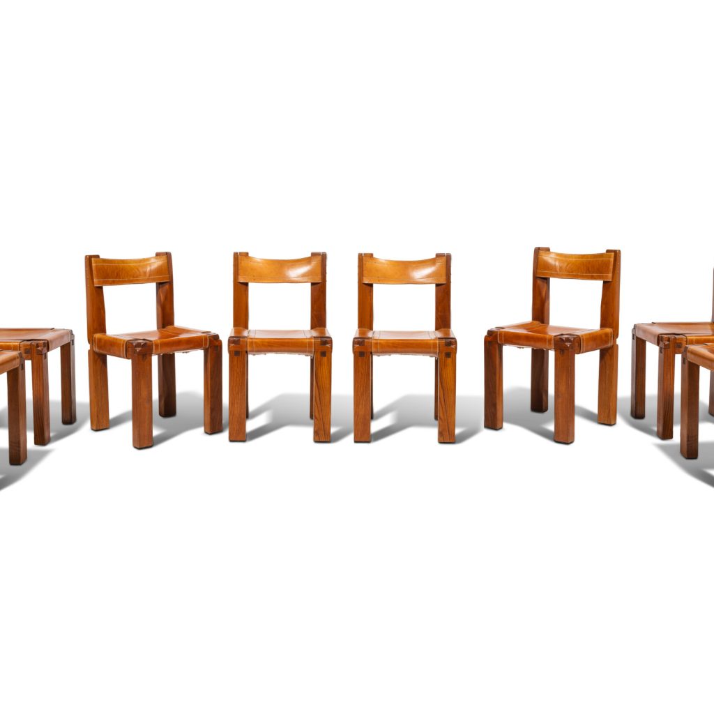 Estimation "Arts Nouveau & Arts Décoratif" et expertise de cette suite de 8 chaises de salle à manger en bois et cuirde "Pierre CHAPO" proposée à la vente par notre cabinet d'expertise, adjugée 10 000 €